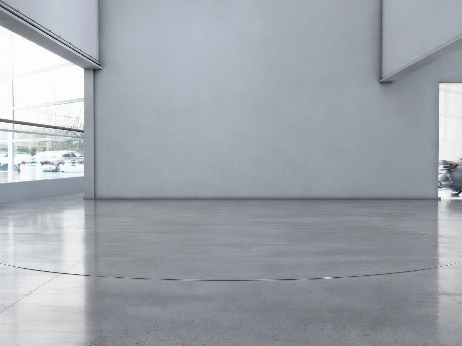 The “Blue-grey showroom, side window, ring” background on its own, with no vehicle.