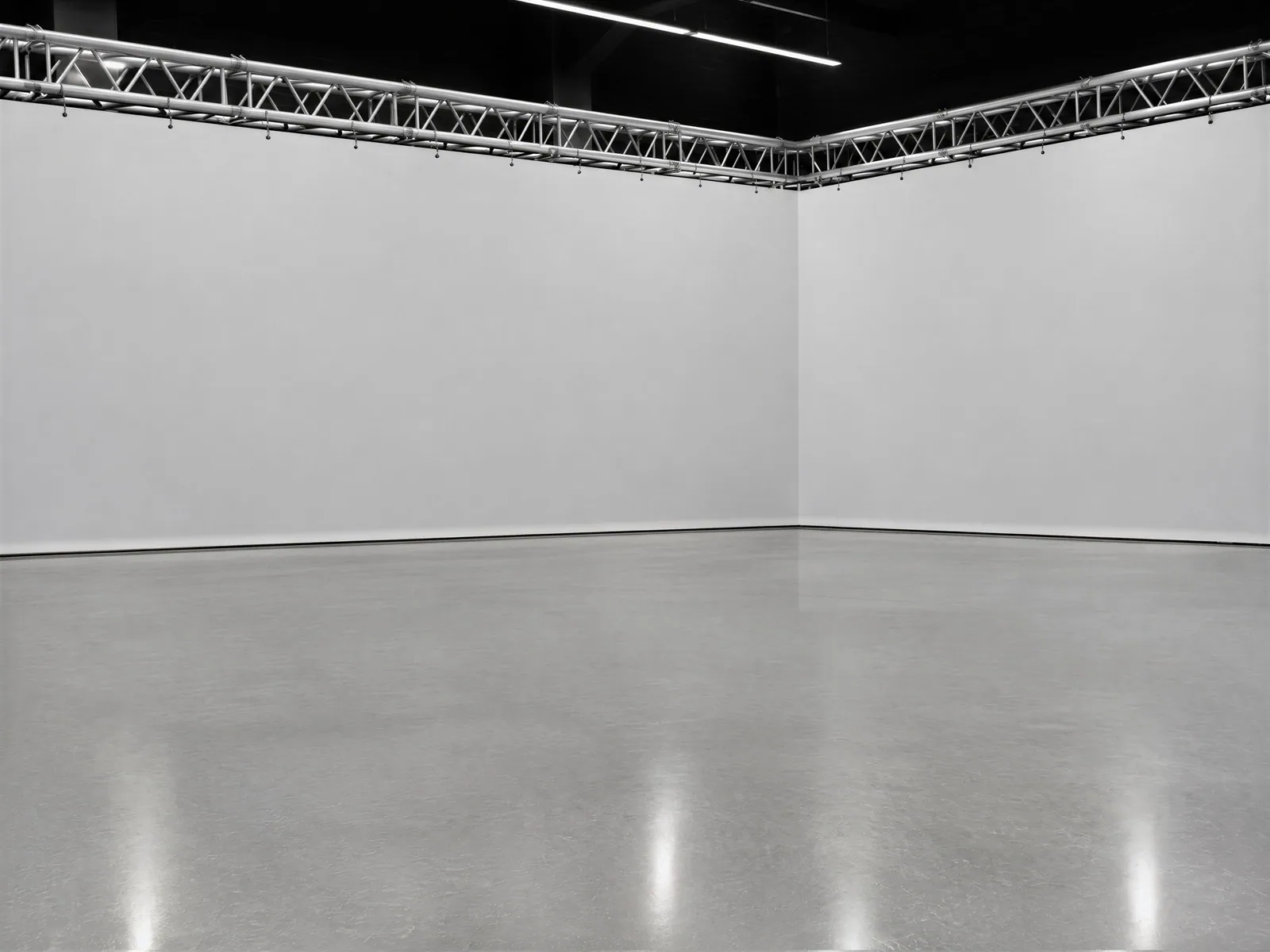 The “Truss-lit white studio” background on its own, with no vehicle.