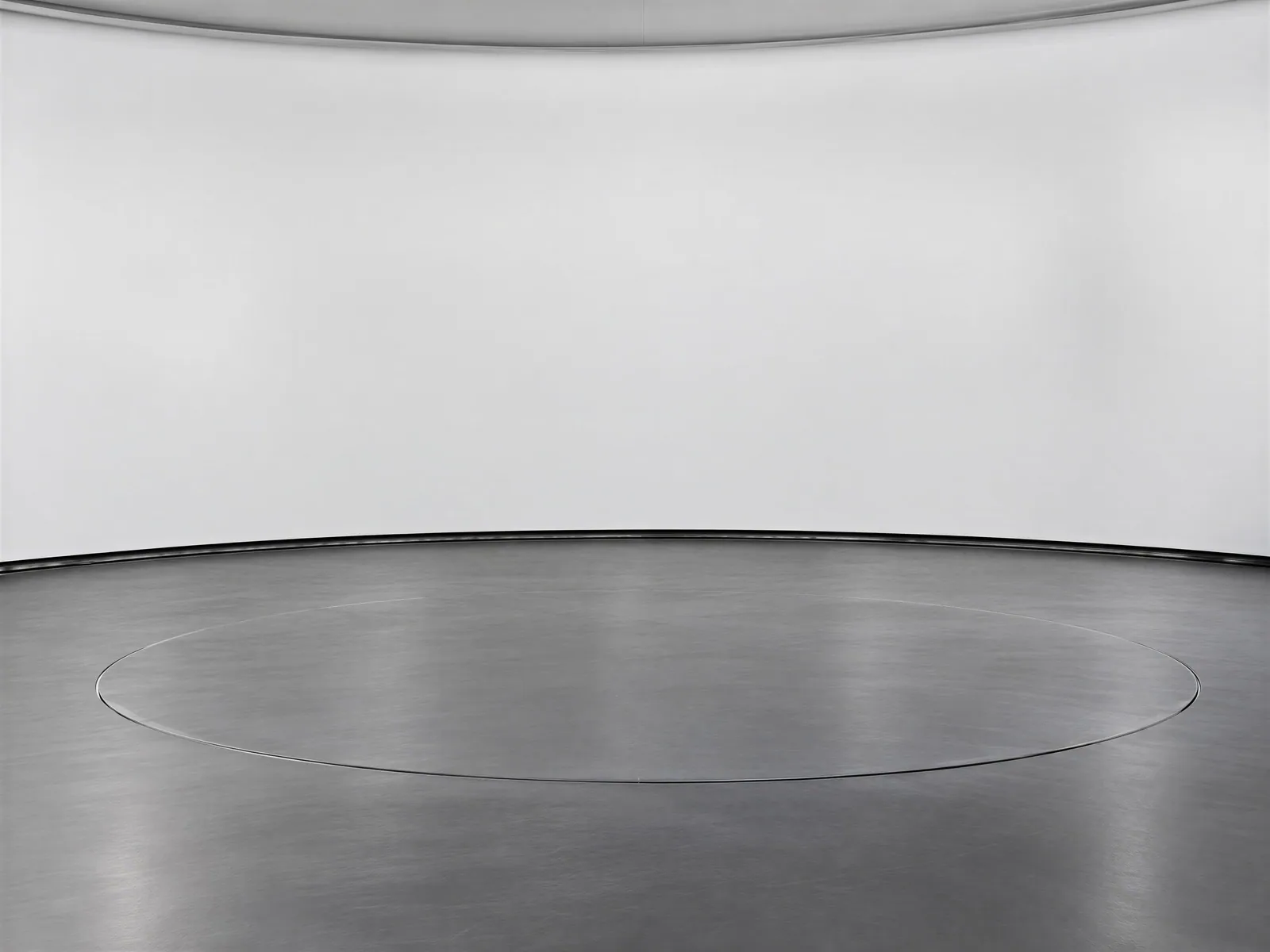 The “White backdrop, graphite floor, ring” background on its own, with no vehicle.