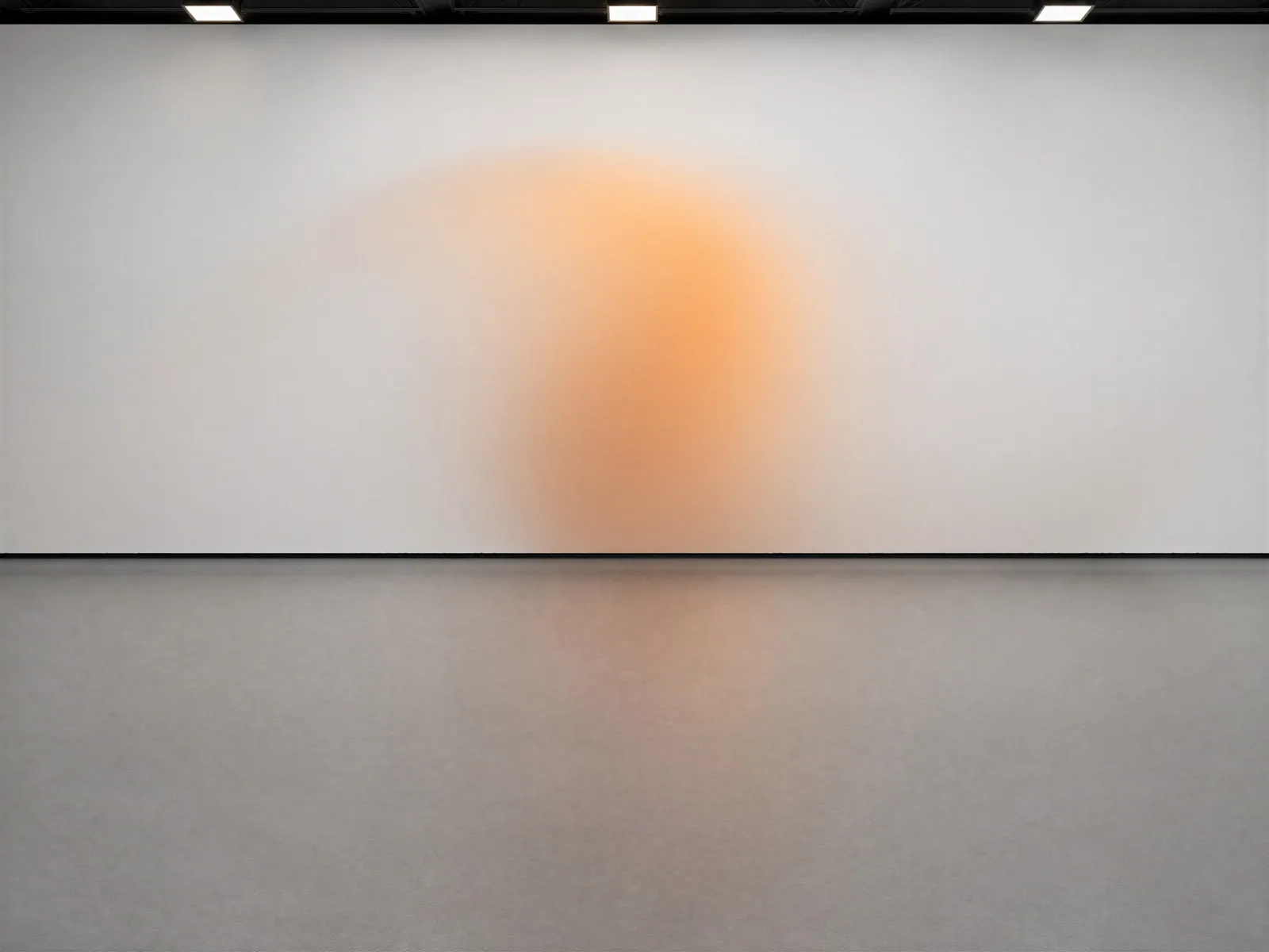 The “White wall, amber glow” background on its own, with no vehicle.