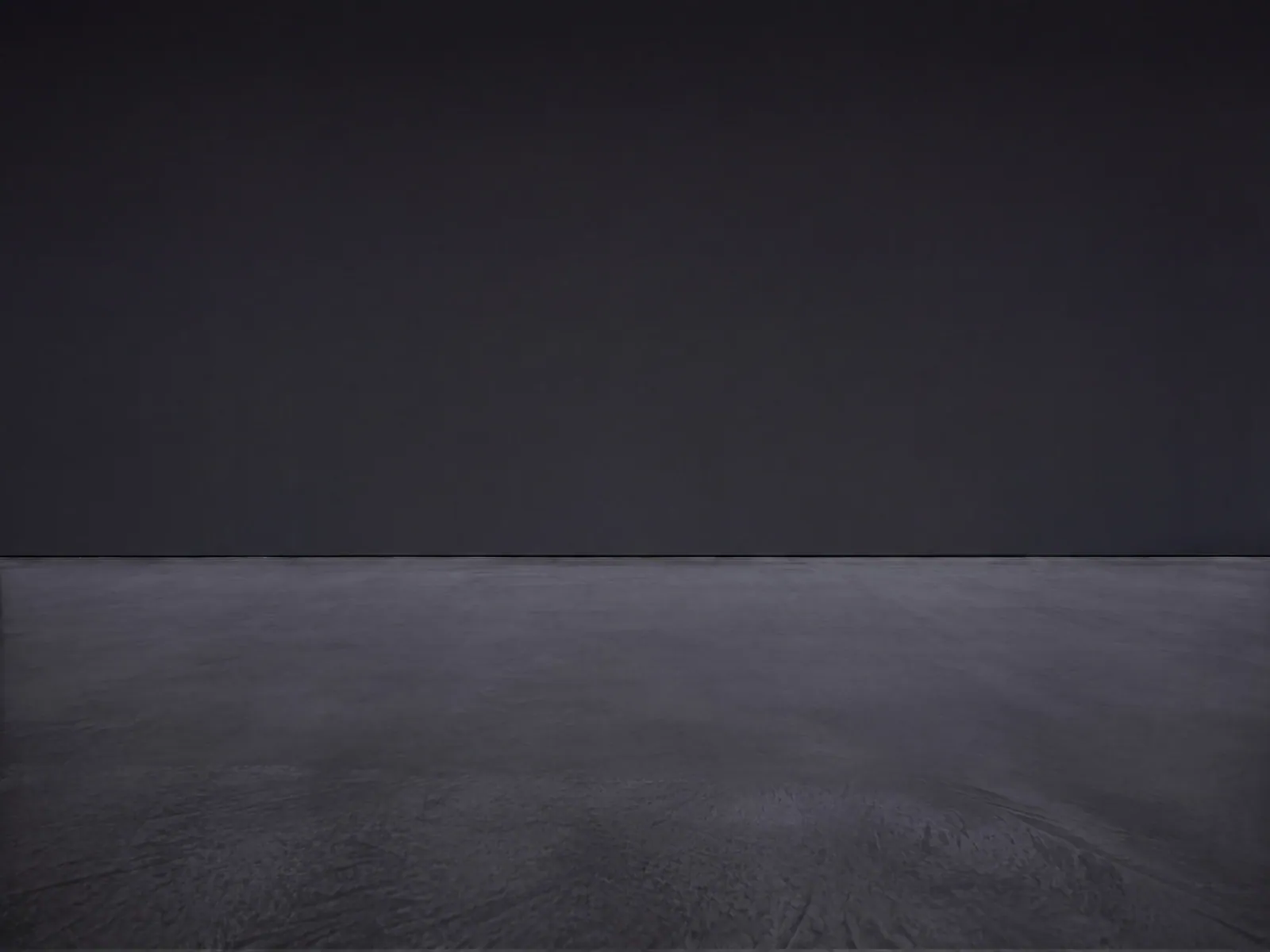 The “Dark showroom floor” background on its own, with no vehicle.