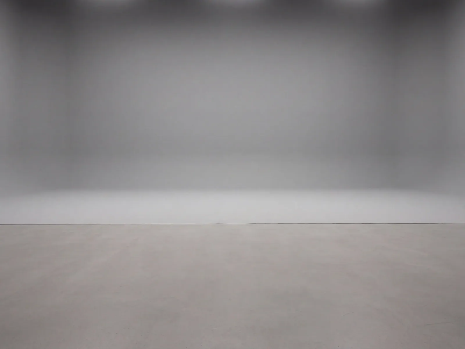 The “Gray studio floor” background on its own, with no vehicle.