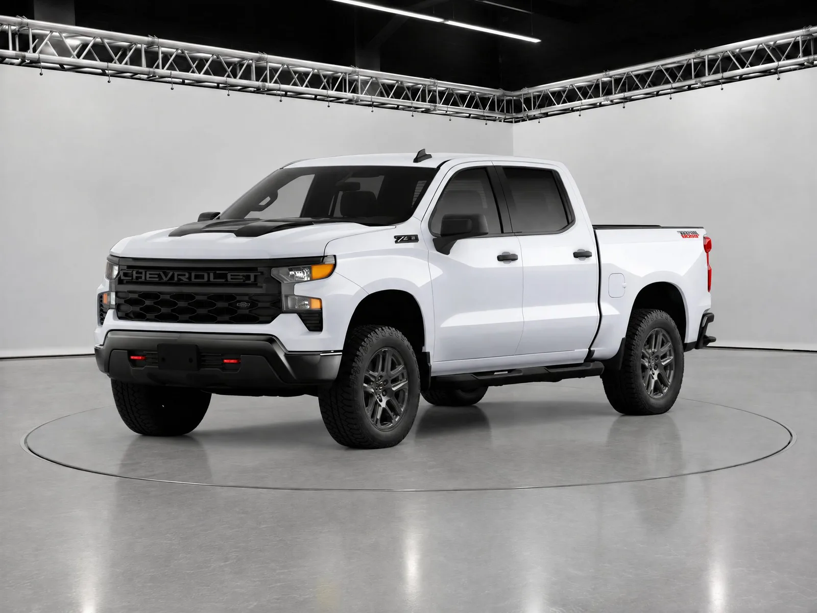 Pickup truck on the “Truss-lit white studio, ring” background.