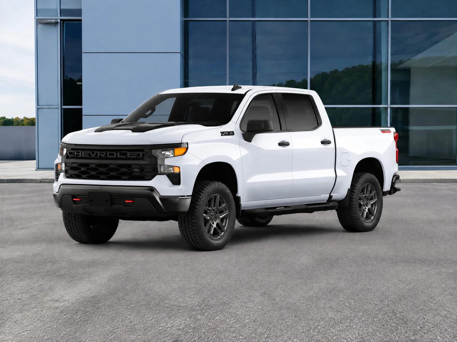Pickup truck on the “Glass dealership front, asphalt lot” background.