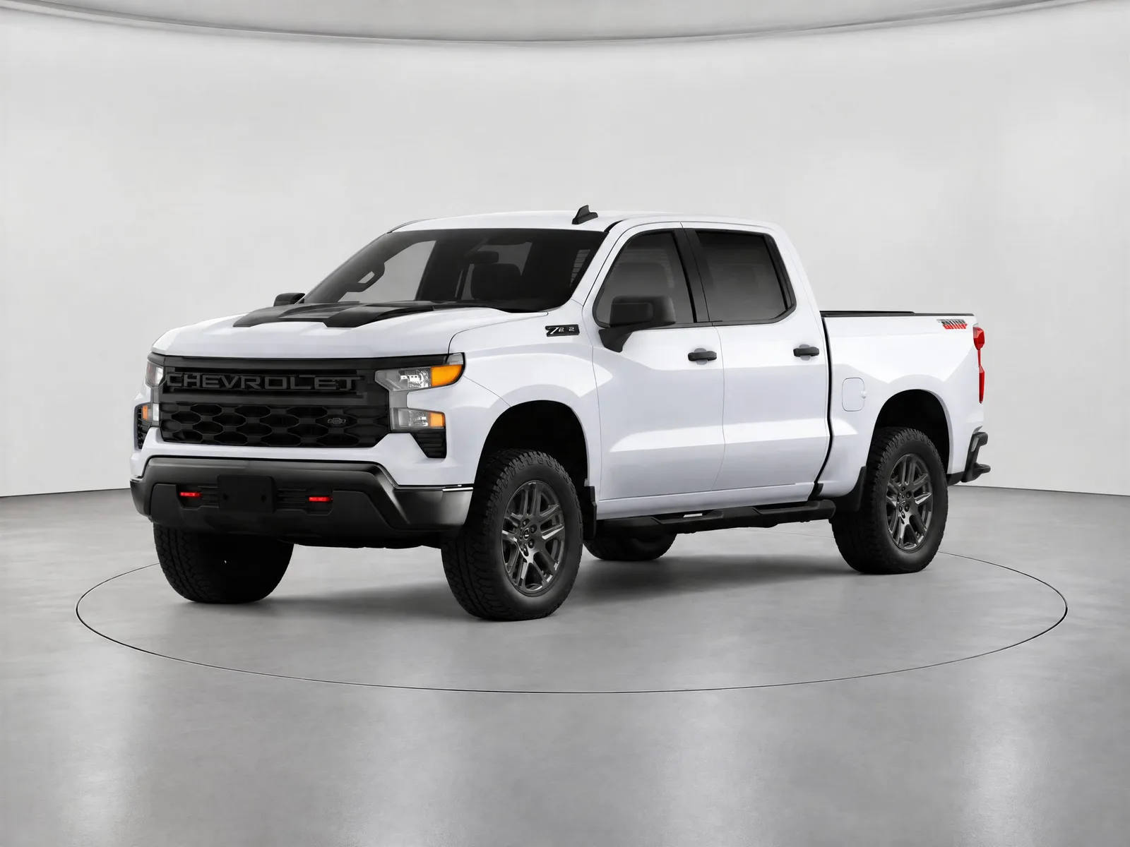 Pickup truck on the “White backdrop, light grey floor, ring” background.